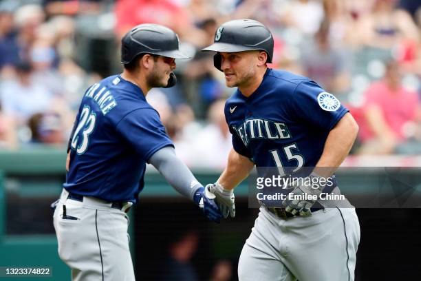 Kyle Seager of the Seattle Mariners celebrates his solo home run with Ty France in the third inning during their game against the Cleveland Indians...