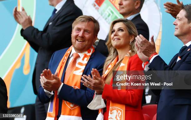 Willem-Alexander, King of the Netherlands and Queen Maxima of the Netherlands applaud prior to the UEFA Euro 2020 Championship Group C match between...