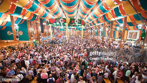beer fest from within tent - oktoberfest stock-fotos und bilder