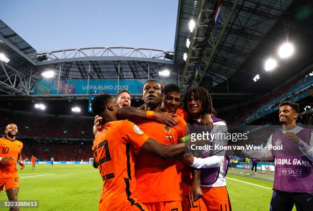 Georginio Wijnaldum of Netherlands celebrates with teammates after scoring their side's first goal during the UEFA Euro 2020 Championship Group C...