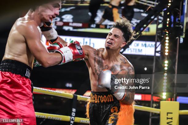 Austin McBroom fights Bryce Hall during LivexLive's Social Gloves: Battle Of The Platforms PPV Livestream at Hard Rock Stadium on June 12, 2021 in...