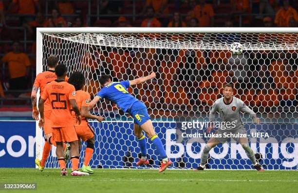 Roman Yaremchuk of Ukraine scores their side's second goal past Maarten Stekelenburg of Netherlands during the UEFA Euro 2020 Championship Group C...