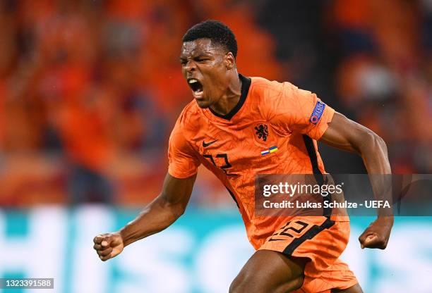 Denzel Dumfries of Netherlands celebrates after scoring their side's third goal during the UEFA Euro 2020 Championship Group C match between...