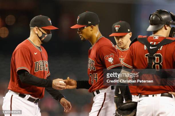 Starting pitcher Jon Duplantier of the Arizona Diamondbacks is removed by manager Torey Lovullo during the second inning of the MLB game against the...