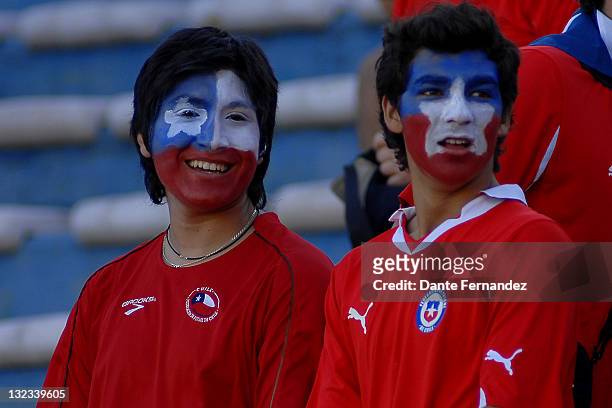 The fans encouraging their team during the match between Uruguay and Chile as part of the South American World Cup Brazil 2014 at the Estadio...