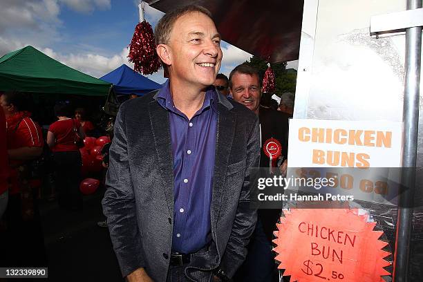 Labour Leader Phil Goff visits food stalls at the Otara Markets on November 12, 2011 in Auckland, New Zealand. New Zealanders will head to the polls...