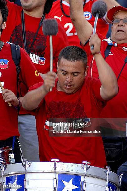 Chile's fans cheer to their team during their match as part the South American Qualifiers for FIFA World Cup Brazil 2014 at Centenary Stadium on...