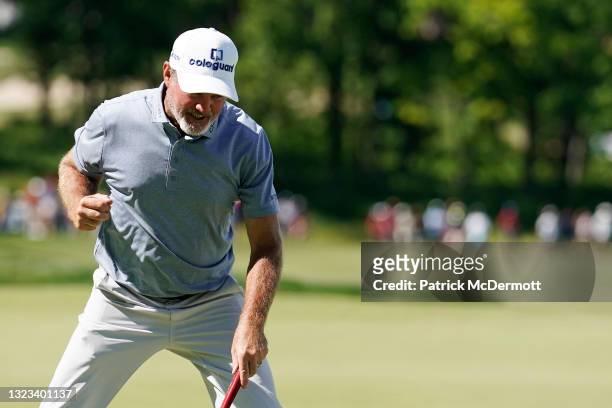 Jerry Kelly of the United States celebrates after making his putt for par on the 18th green during the final round of the American Family Insurance...