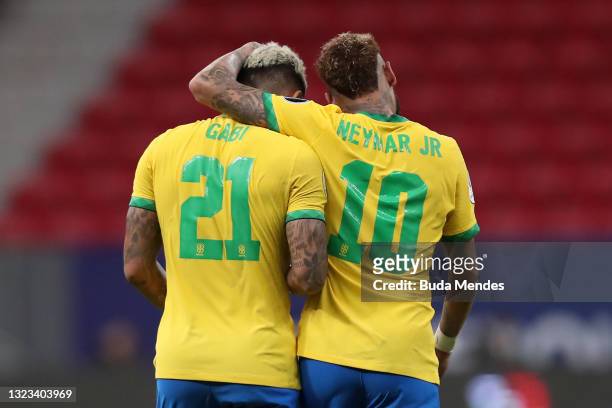 Gabriel Barbosa of Brazil celebrates with teammate Neymar Jr. After scoring the third goal of his team during a Group B match between Brazil and...