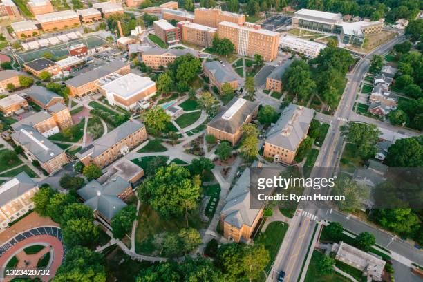 aerial over north carolina central university in the spring - duke v north carolina stock pictures, royalty-free photos & images