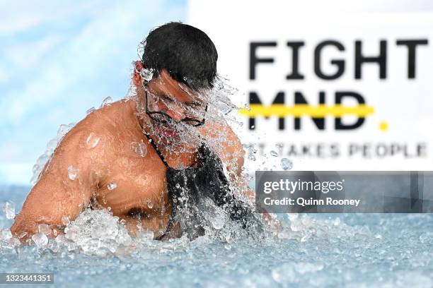 Jeff Farmer goes down the slide during the Big Freeze slide at Melbourne Cricket Ground on June 14, 2021 in Melbourne, Australia. The annual event...