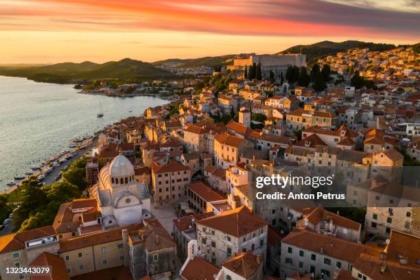 aerial view of old town of sibenik in croatia at sunset - sibenik stock pictures, royalty-free photos & images