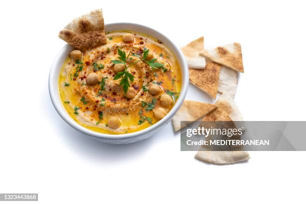 chickpea hummus bowl closeup with pita flatbread dipping isolated on white - healthy snacks stock pictures, royalty-free photos & images