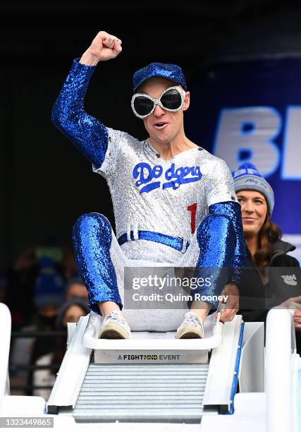 Ray Chamberlain goes down the slide during the Big Freeze slide at Melbourne Cricket Ground on June 14, 2021 in Melbourne, Australia. The annual...