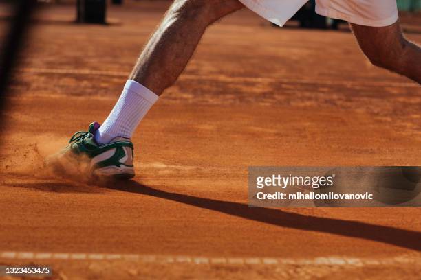 the benefits of playing on clay - tennis stock pictures, royalty-free photos & images