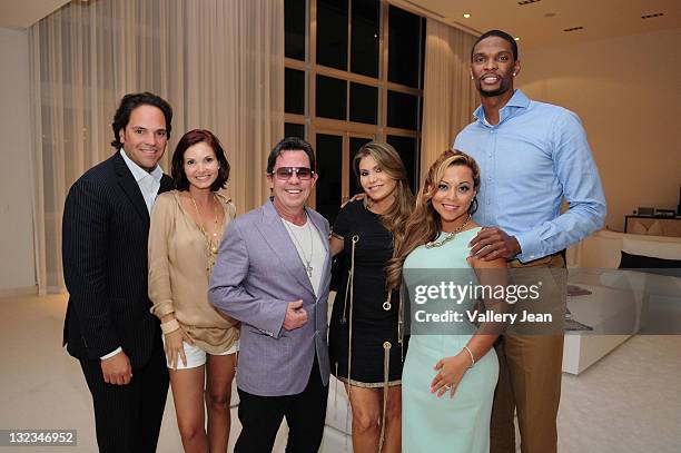 Michael Piazza, Alicia Piazza, JR Ridinger, LorenRidinger, Adrienne Williams and Chris Bosh attend the Haute Living and Dom Perignon kick off of the...