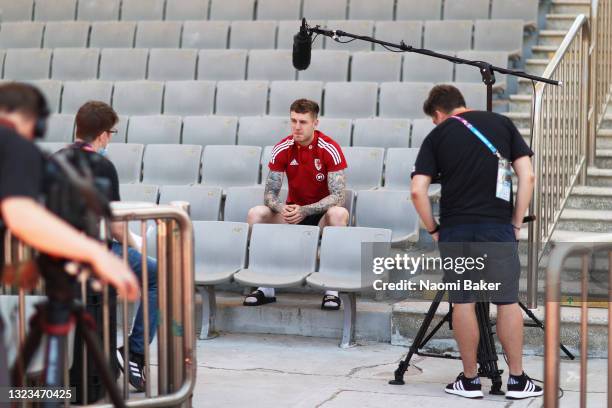 Joe Rodon of Wales speaks to the media ahead of a training session at Tofiq Bakhramov Stadium ahead of the UEFA Euro 2020 Championship on June 14,...