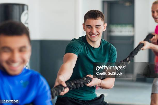 tug of war - youth sports training stock pictures, royalty-free photos & images