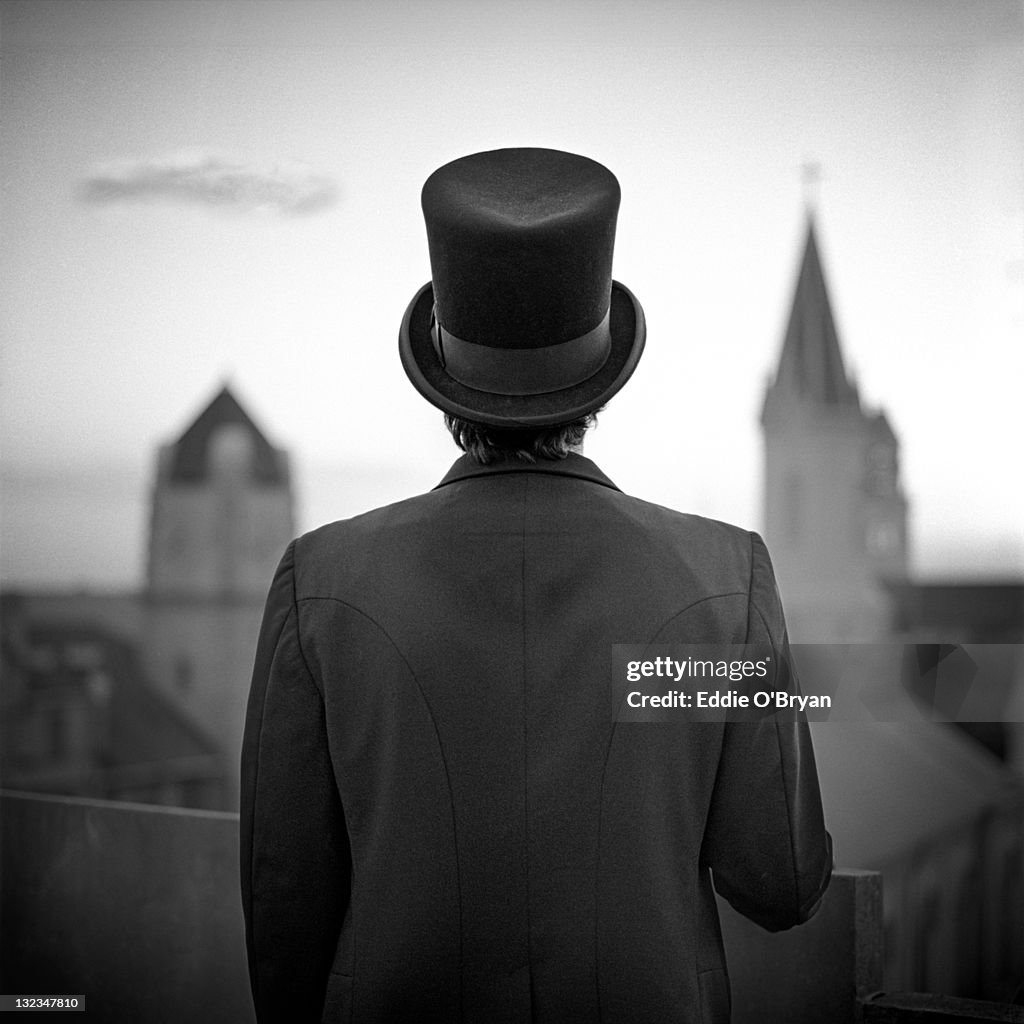 Man standing front of cathedral