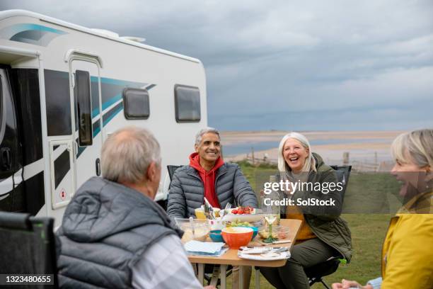 senior couple staycation - travel trailer stock pictures, royalty-free photos & images