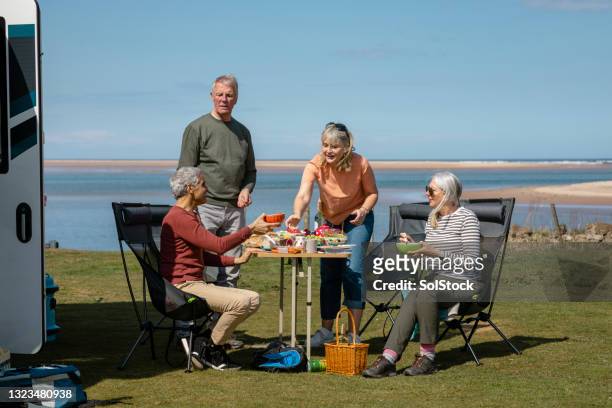 sharing lunch on staycation - caravan uk stockfoto's en -beelden