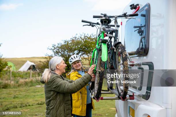 going on a bike ride - caravan uk stock pictures, royalty-free photos & images