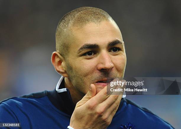 Karim Benzema of France holds his hand to his mouth prior to the International Friendly between France and USA at Stade de France on November 11,...