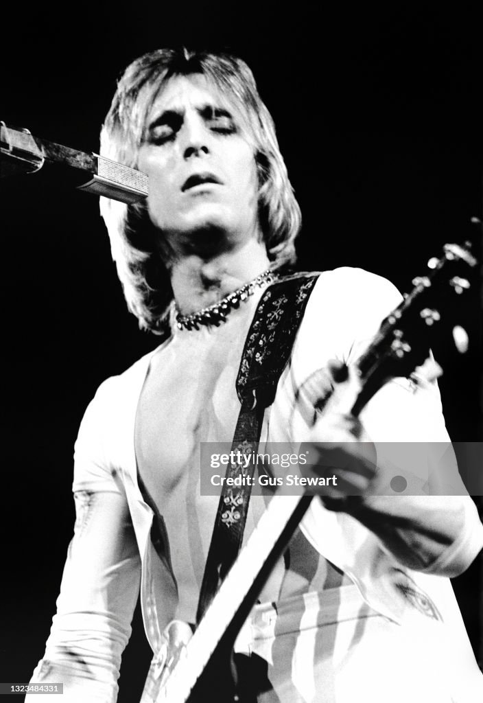 Mick Ronson of the Hunter Ronson Band performs on stage at... News ...