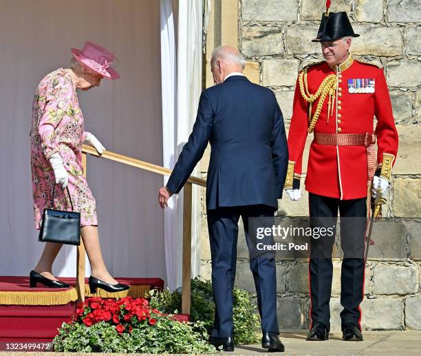 Queen Elizabeth II and U.S. President Joe Biden attend the president's ceremonial welcome at Windsor Castle on June 13, 2021 in Windsor, England....