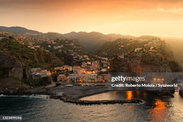 sunset over ponta do sol, madeira, portugal - madeira stock pictures, royalty-free photos & images