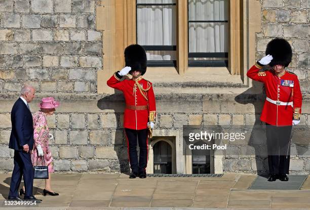 Queen Elizabeth II and U.S. President Joe Biden at Windsor Castle on June 13, 2021 in Windsor, England. Queen Elizabeth II hosts US President, Joe...