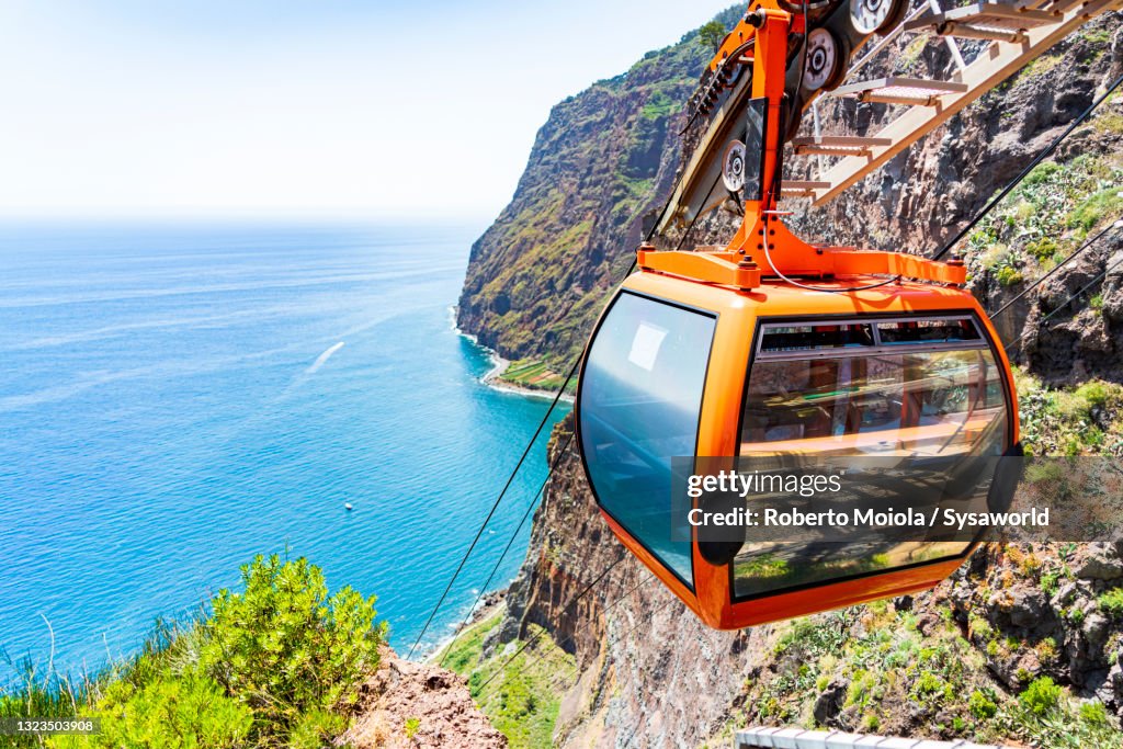 Cable car moving down to the ocean, Madeira