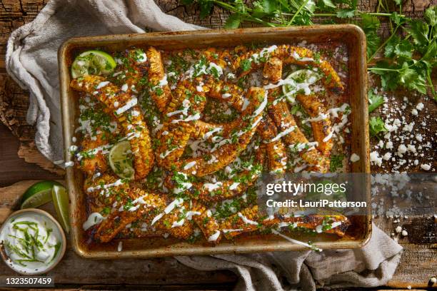the famous bbq corn ribs - baking tray stock pictures, royalty-free photos & images