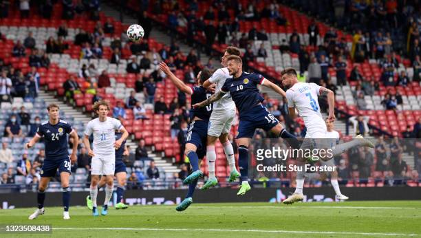 Patrik Schick of Czech Republic scores their side's first goal whilst under pressure from Liam Cooper of Scotland during the UEFA Euro 2020...