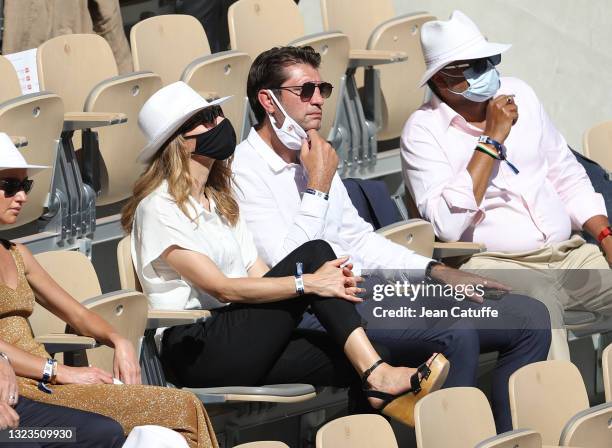 Pierre Rabadan and his wife Laurie Delhostal attend the Men's Singles Final during day 15 of the 2021 Roland-Garros, French Open, a Grand Slam tennis...