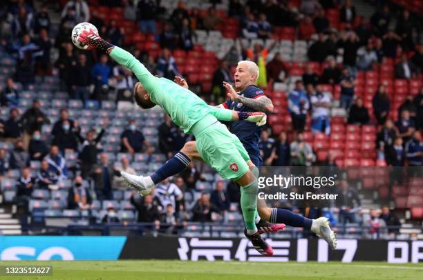 Tomas Vaclik of Czech Republic makes a save from Lyndon Dykes of Scotland during the UEFA Euro 2020 Championship Group D match between Scotland v...