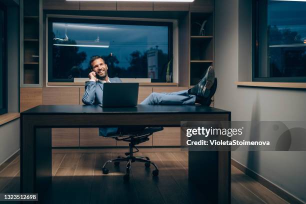 business talk in the office. - feet on table stock pictures, royalty-free photos & images