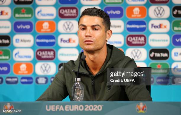 In this Handout picture provided by UEFA, Cristiano Ronaldo of Portugal speaks to the media during the Portugal Press Conference ahead of the Euro...