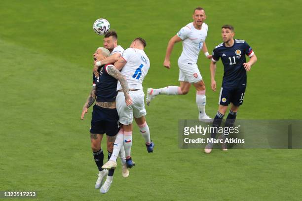 Lyndon Dykes of Scotland is challenged by Ondrej Celustka of Czech Republic and Tomas Kalas of Czech Republic during the UEFA Euro 2020 Championship...