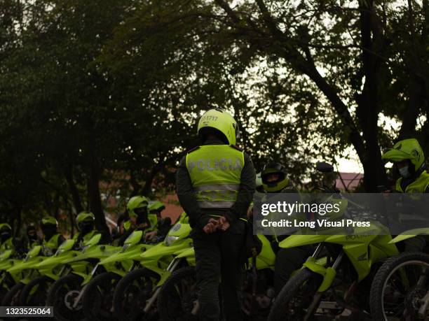 Colombian police officer walks in front of police motorbikes as the Colombian and Argentina teams played a qualifying match for FIFA Quatar World Cup...