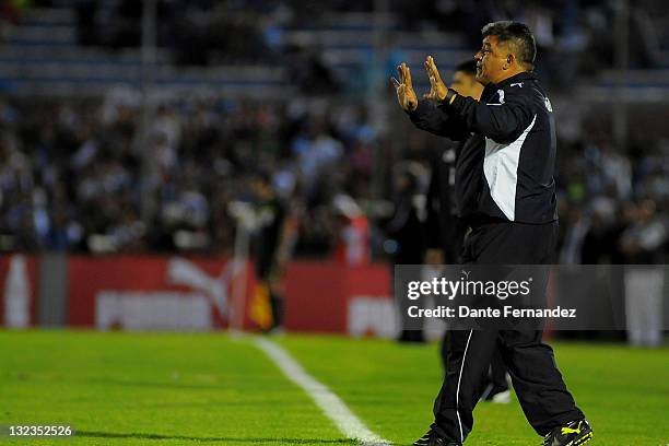 Chile coach Claudio Borghi watches his players during the match between Uruguay and Chile in the third round of the South American World Cup Brazil...