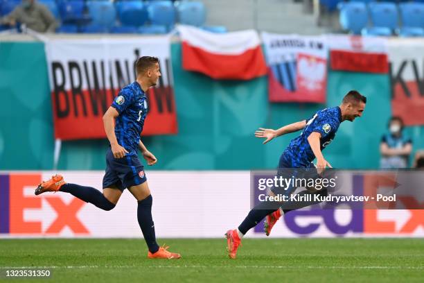 Robert Mak of Slovakia celebrates after scoring their side's first goal during the UEFA Euro 2020 Championship Group E match between Poland and...