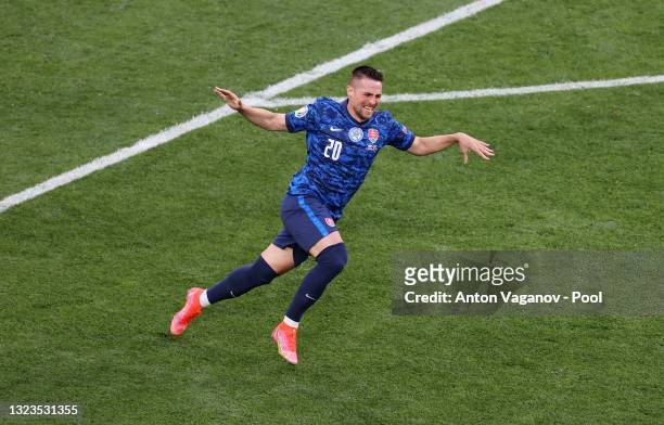Robert Mak of Slovakia celebrates after scoring their side's first goal during the UEFA Euro 2020 Championship Group E match between Poland and...
