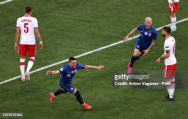 Robert Mak of Slovakia celebrates after scoring their side's first goal during the UEFA Euro 2020 Championship Group E match between Poland and...