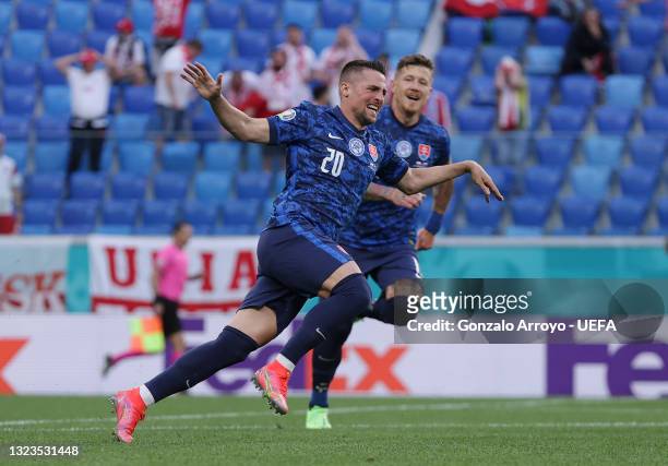 Robert Mak of Slovakia celebrates their side's first goal, an own goal by Wojciech Szczesny of Poland during the UEFA Euro 2020 Championship Group E...