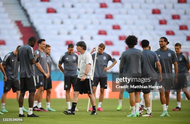 Joachim Loew, Head Coach of Germany speaks to his players during the Germany Training Session ahead of the Euro 2020 Group F match between France and...