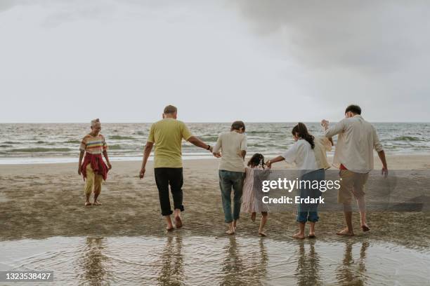 happiness moment of family at the beach-stock photo - large family stock pictures, royalty-free photos & images