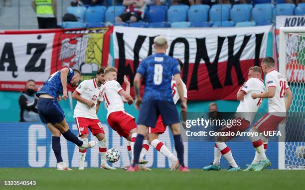 Milan Skriniar of Slovakia scores their side's second goal during the UEFA Euro 2020 Championship Group E match between Poland and Slovakia at the...