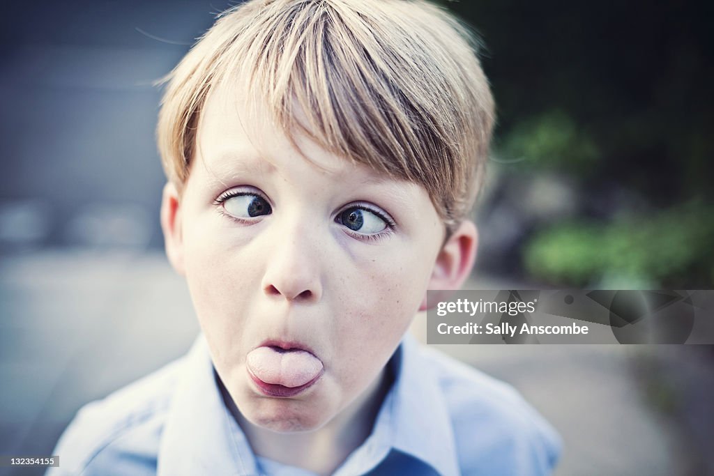 Boy being pulling silly face