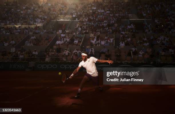 Stefanos Tsitsipas of Greece plays a backhand in his match against Novak Djokovic of Serbia during the Men's Singles Final match on Day Fifteen of...